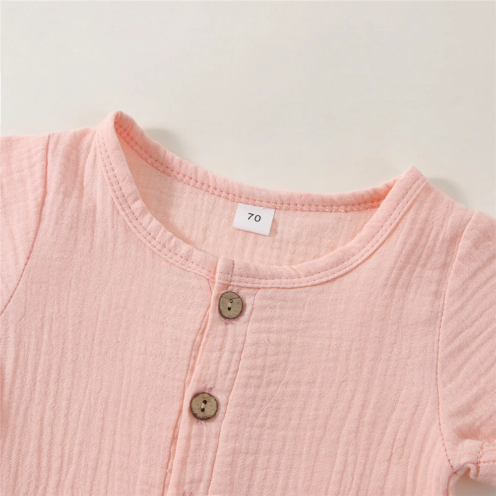 幼児の赤ちゃん女の子少年Romper固体色のショートスリーブは常に短い時間でご利用夏のボタンでカジュア綿のリネンの服